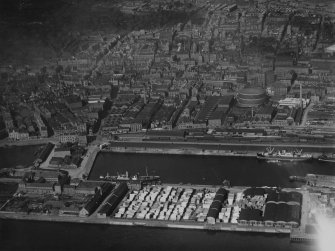 Dundee, general view, showing Victoria Dock and Dundee Foundry.  Oblique aerial photograph taken facing north.  This image has been produced from a print.