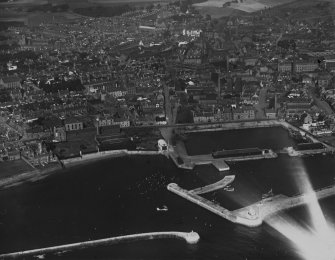 Arbroath, general view, showing Arbroath Harbour and East Mary Street.  Oblique aerial photograph taken facing north.  This image has been produced from a print. 