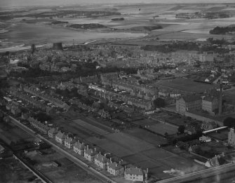 Montrose, general view, showing Links Park Football Ground and Christie's Lane.  Oblique aerial photograph taken facing north-west.  This image has been produced from a print.