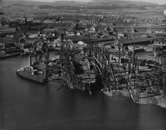 John Brown's Shipyard, Clydebank, Queen Elizabeth under construction.  Oblique aerial photograph taken facing north.  This image has been produced from a print.
