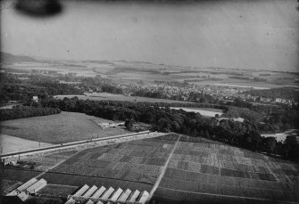 Dobbie and Co. Melville Nurseries, Gilmerton Road, Edinburgh.  Oblique aerial photograph taken facing east.  This image has been produced from a print.