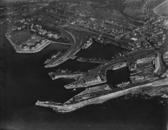 Ardrossan, general view, showing Ardrossan Harbour and Castle Hill.  Oblique aerial photograph taken facing east.  This image has been produced from a print.