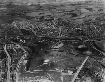 Glasgow, general view, showing Provan Gas Works, Provan Road and Hogganfield Loch.  Oblique aerial photograph taken facing east.  This image has been produced from a print. 