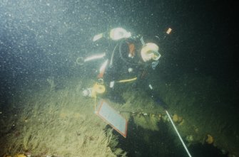 Maritime photographs: Underwater photograph of a diver planning the wreck site