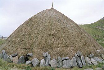 Detail of the thatched roof of the reconstructed house.