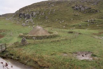 General view of the reconstructed house taken from the south.