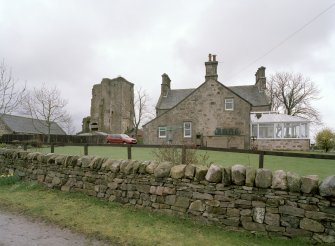 General view of tower and farmhouse from NNE