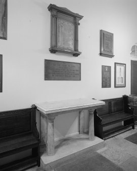 Interior. Entrance Hall. Marble table and memorials. Detail