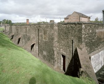 View of Deanston Mills bonded warehouse from S. Formerly the textile mill weaving shed.