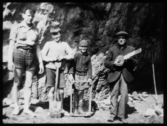 View of A Ferguson, J McSporran, Henry and 'Tramp' outside Keil Cave.