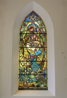 Interior. S wall W stained glass window by Charles Florence of The First Communion
