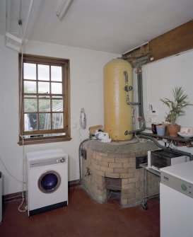 Interior. Ground floor. laundry. Detail of boiler