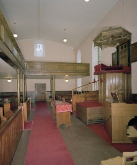 Interior. View from W showing pulpit and galleries