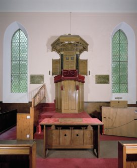 Interior. Pulpit and communion table. View from NNW