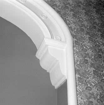 Interior.  Detail of moulded corbel above alcove in dining room.