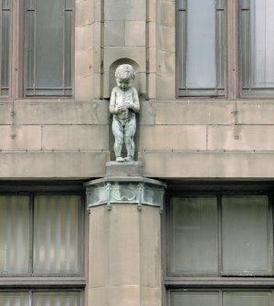 E side. Decorative cherub. Detail
