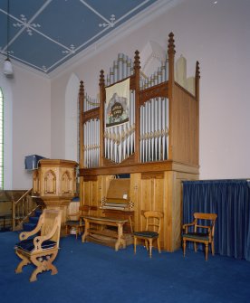 Interior. Organ and pulpit. View from SE