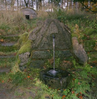 View of fountain with well head in background