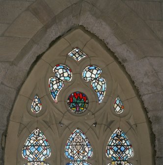 Interior. Detail of panel at top of stained glass window