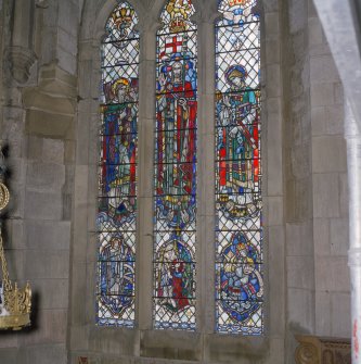 Interior. Detail of stained glass window at SE corner