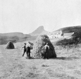 Copy of a historic photographic view of Galmisdale, Old Inn, with hay making in the foreground. 
Copied from the Banff Album.