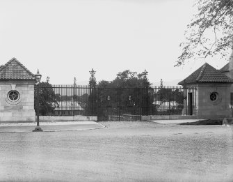 View of the gatepiers seen from Grange Loan from the North with building construction of Millbank Pavilion visible in the background at Astley Ainslie Hospital, Edinburgh.
