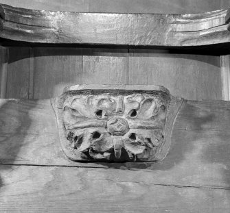 Poltalloch, St Colmba's Chapel.
Misericord (a). Detail of carving of seat.