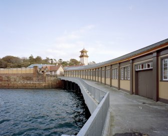 View of north side of covered walkway to ferry fro West.