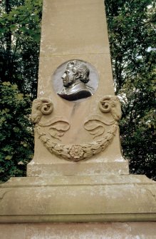 View of unidentified memorial monument with rams' heads, Caddonfoot graveyard.