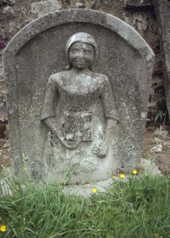View of headstone to Anne Eliot d. 1825, showing bible and rose, Castleton Churchyard