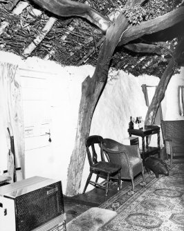 Interior view of cruck-framed cottage; Torthorwald, Dumfriesshire. 
