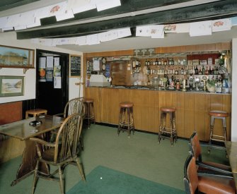 Interior. Public Bar from S showing the bar counter