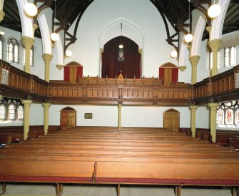 Interior. View from NW from the platform towards the gallery and the magistarates pew