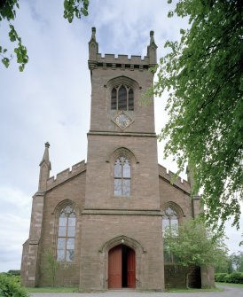 View of frontage showing tower and entrance from W