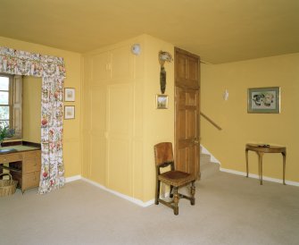Interior. Entrance hall from NW showing N entrance lobby and stair