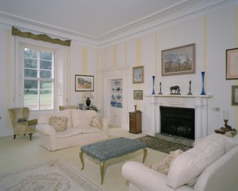 Interior. East wing Drawing room showing early 19th century fireplace and lying pane glazing