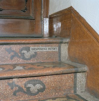 Interior.  Circle, lobby, detail of floor manufacturer's patent on steps