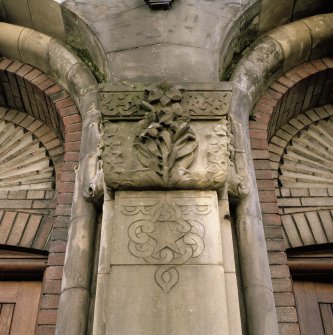 W front. Detail of triple arch sculpture