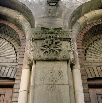 W front. Detail of triple arch sculpture