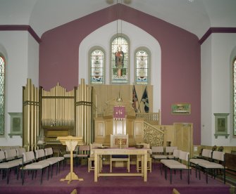 Interior. View from NE showing pulpit, communion table and organ