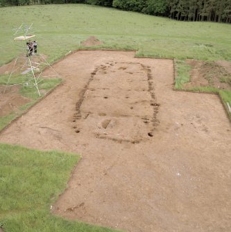 Site under excavation. Hi-spy view from SW with ranging poles.