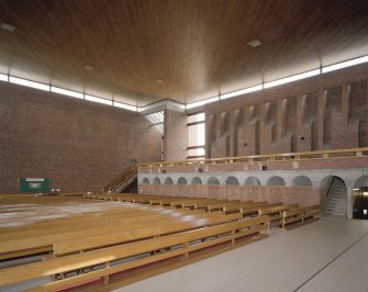Interior. View of light wells and concrete corbel course