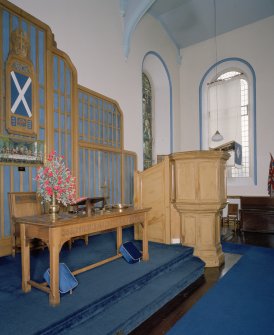 Interior. View of chancel showing communion table and pulpit