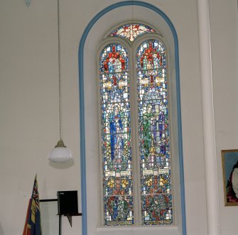 Interior. Detail S Aisle E stained glass window the Gavin Family Memorial "My soul doth magnify.." including a coal mine and miner