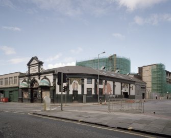View of rounded corner with Semple Street from SE