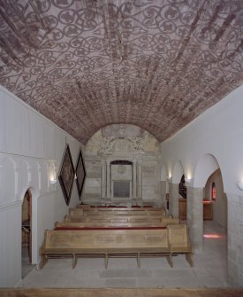 Interior, view of original chapel from W showing barrel-vaulted timber boarded ceiling