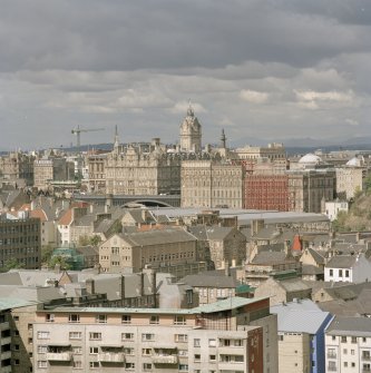 Distant view showing The Balmoral Hotel, North Bridge and the former GPO building from Salisbury Crags to South East