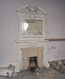 Interior. Ground floor, morning room, view of fireplace with mirror above