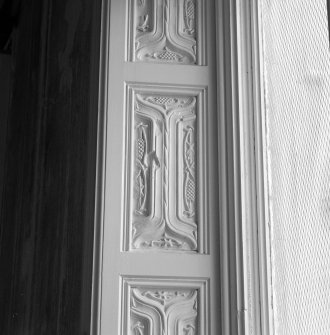 Interior. Ground floor, dining room, detail of carved panel on window shutter