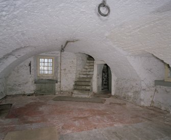 Interior. Ground floor vaulted entrance hall showing staircase